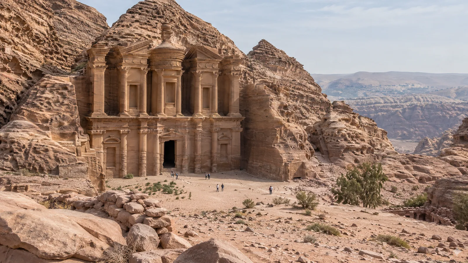 The Monastery at Petra viewed from the visitor path in natural daylight.