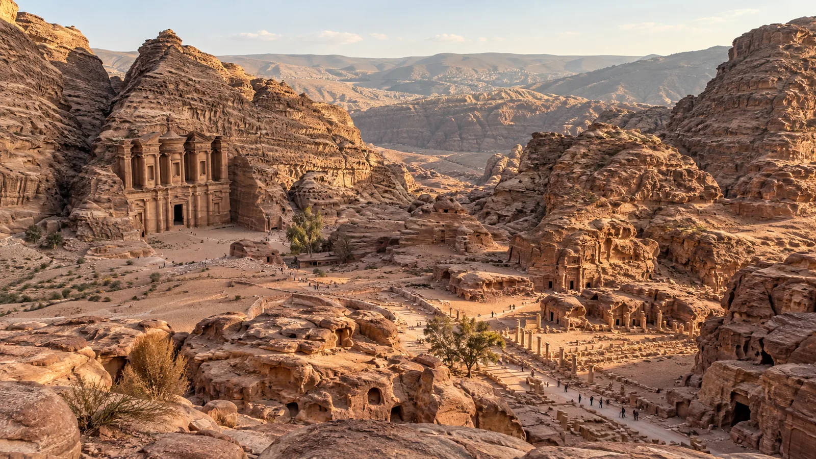 Wide view across the sandstone ridges and ruins of Petra.
