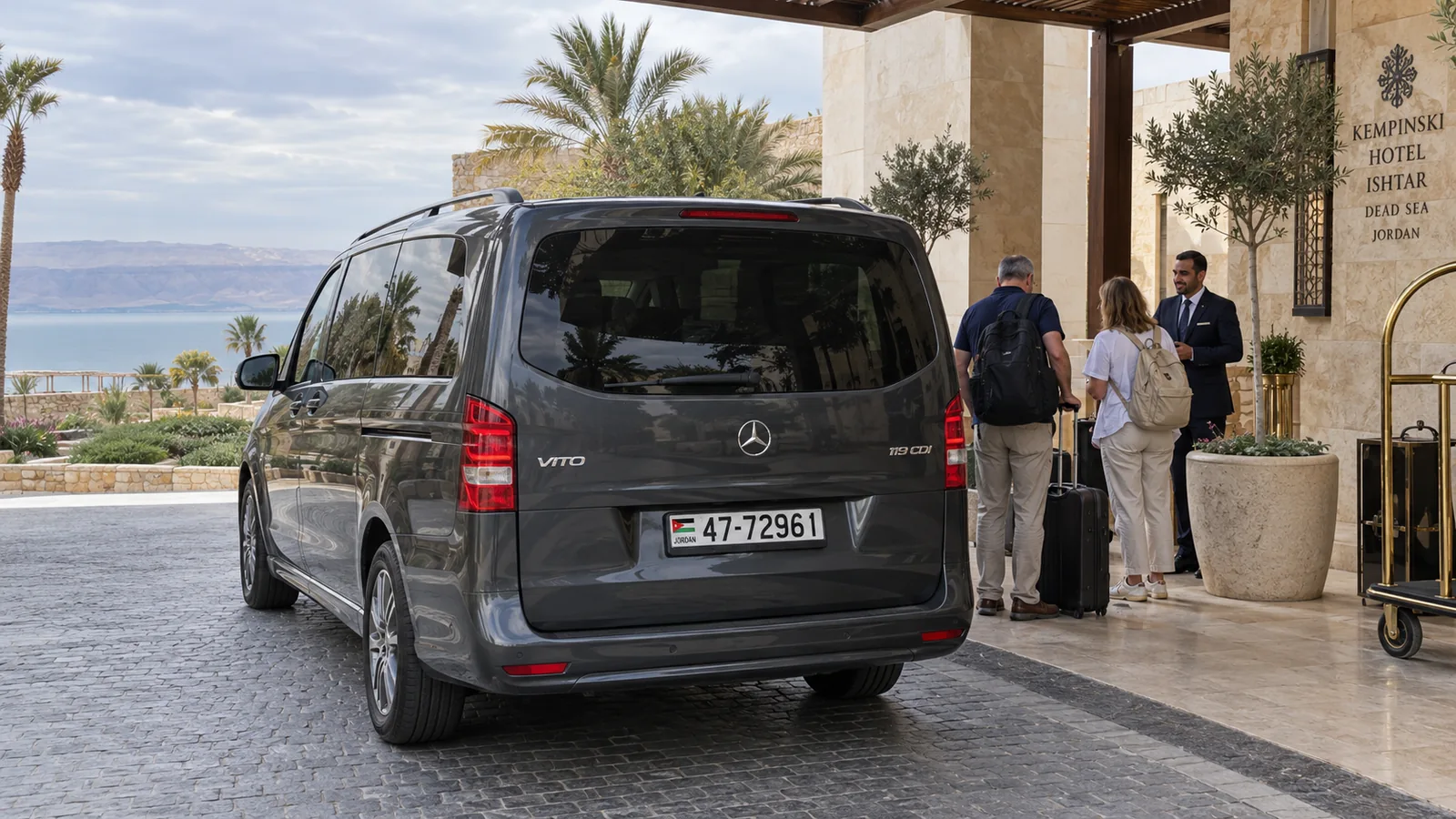 A Mercedes-Benz Vito arriving at a Dead Sea resort with adult guests.
